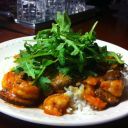 Shrimp, Baby Bella in a spicy sauce over rice topped with arugula infused in olive oil vinegar!