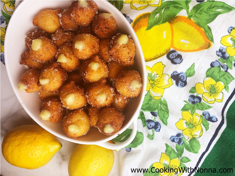 Lemon Ricotta Zeppole filled with White Chocolate Pastry Cream Lemon Ricotta Zeppole filled with White Chocolate Pastry Cream