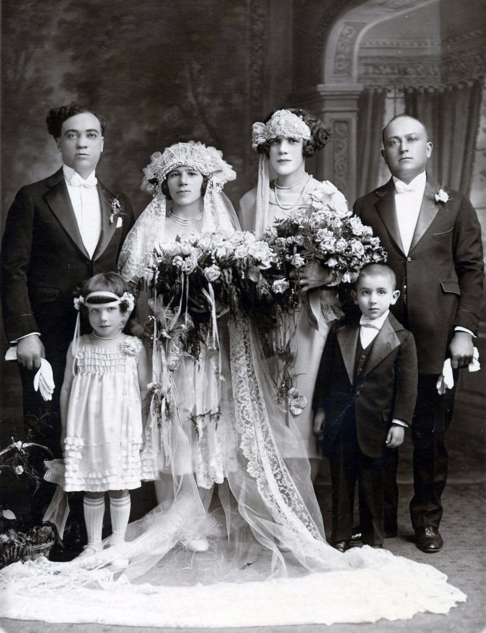 and one more.... A great lady and a Mulberry street legend... my bisnonna's sister in law Anna Maria Cornacchia-Gifoli on her wedding day. She never was able to have kids but was a nonna to all that new her. Her husband Crestino Gifoli was from Serramezzano. Wedding. June 6 1926 - Geraldo Maffea and Irene Trezza as witnesses. Also my Grandmother Filomena is that CUTE little girl.