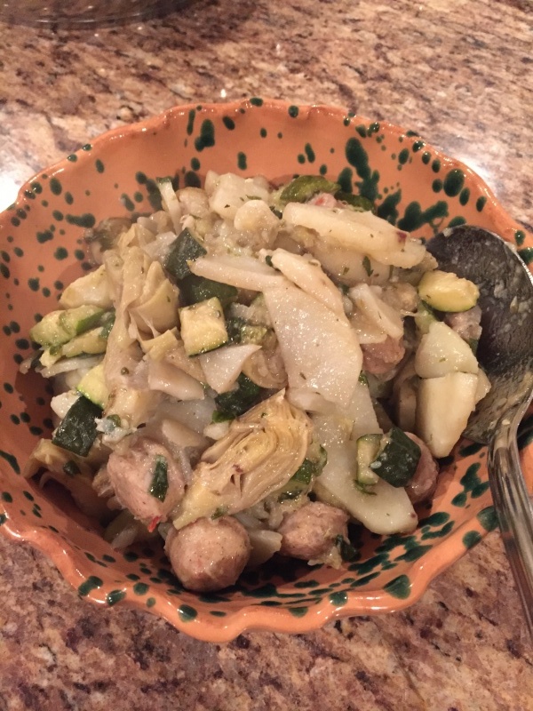 I recently bought a new sauté pan at Home Goods which inspired me to make this dish tonight. I also had some leftover zucchini from a cooking class I conducted a few days ago, so I was really also looking for an excuse to cook them up!<br /><br />Italian veggie medley stir-fry <br />Serves 4<br />Ingredients<br />3 zucchini – washed and diced<br />2 – 3 medium potatoes – peeled, washed, cut in half and sliced thinly<br />1 bag frozen artichoke hearts (Trader Joe’s has the best ones!)<br />1 medium onion – thinly sliced<br />2 garlic cloves – finely chopped<br />2 tablespoons parsley, chopped<br />1 teaspoon of oregano<br />1 teaspoon salt<br />2 – 3 sweet Italian sausages, thinly sliced (I used pre-cooked ones in this dish)<br />2 – 3 tablespoons oil<br />1 cup of water<br />Directions<br />1) In a large sauté pan add all of your ingredients except the water<br />2) Stir fry the ingredients for just a few minutes on medium heat<br />3) After a few minutes, lower your heat to low-medium and add ½ cup of water and let that cook uncovered for about 12 to 13 minutes, check on them a